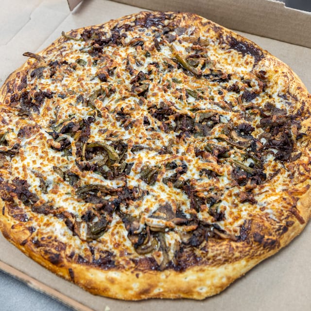 Philly Steak or Philly Chicken Pizza.